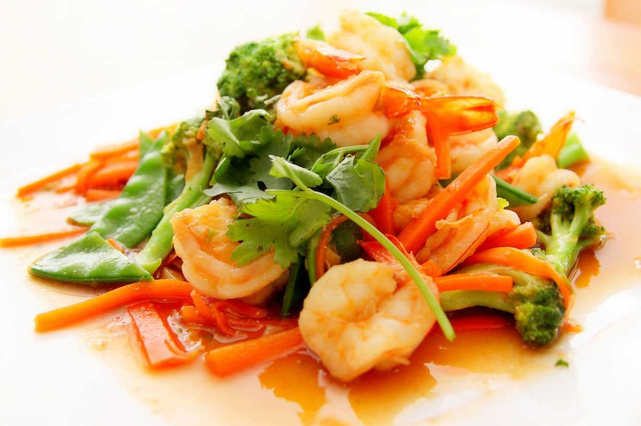 Juicy shrimp sautéed in garlic butter with a mix of fresh vegetables