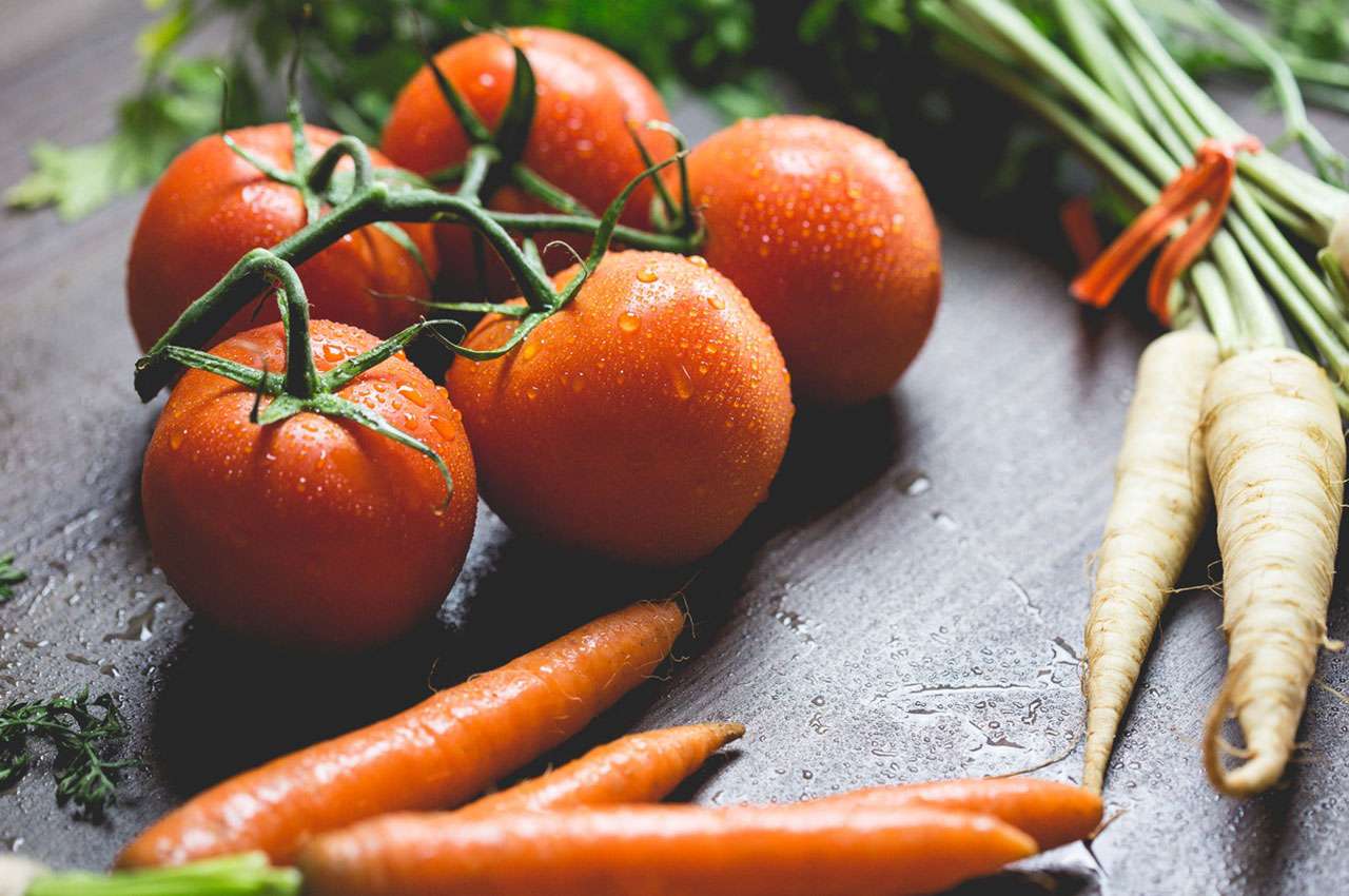 Fresh tomatoes and carrots straight from the farm